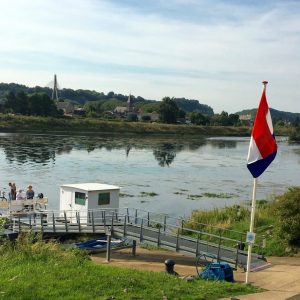 small ferry for hikers and bikers only over the river Meuse at Eijsden